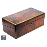 A late 19th Century figured walnut and brass bound writing slope, tooled leather set slope and