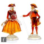 A pair of mid 20th Century Italian Venetian Murano glass figures of a couple in period dress in