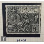 An extensive collection of British postage stamps contained within eighteen Stanley Gibbons Tower