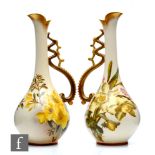 A pair of late 19th to early 20th Century George Jones & Sons flower jugs each decorated with a