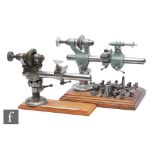 A Pultra watch maker's lathe with collets and tools, on an oak plinth base, width 24cm, and a Wolf