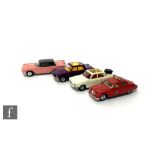 Four Corgi Toys diecast models, comprising 275 Rover 2000 TC in white with maroon interior and amber