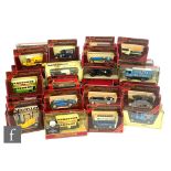 A collection of Matchbox Models of Yesteryear, all in red or cream boxes. (53)
