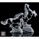 A later 20th Century Wedgwood clear crystal figure of a rearing stallion raised to an integral base,