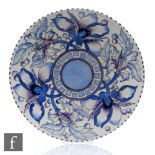 A 1930s Charlotte Rhead Bursley Ware charger decorated in the TL43 Peony pattern, printed mark,