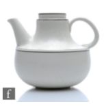 A later 20th Century Arabia Birka teapot after the 1970s original designed by Stig Lindberg, printed
