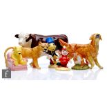 A Beswick Polled Hereford Bull, together with a Beswick lioness, a Royal Doulton retriever dog,