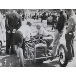 A collection of 1930s and 1940s photographs of vintage cars, racing drivers and race tracks, some