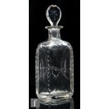 A 20th Century clear crystal glass decanter, of rectangular section decorated with star cuts