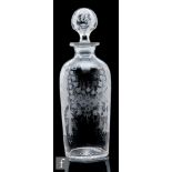 A late Victorian clear crystal decanter, of shouldered cylinder form, the body with engraved