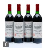 Four bottles of 1986 Chateau Grand-Puy-Lacoste, red Bordeaux, 750ml. (4)