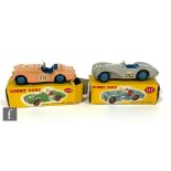 Two Dinky Toys diecast model sports cars, 111 Triumph TR2 with pink body, mid-blue interior, mid-