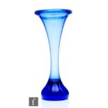 A 20th Century Humppila glass vase, of waisted form with flared rim, all in a graduated blue ground,