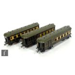 Three O gauge Hornby Pullman coaches, Verona, Loraine and Arcadia, unboxed.