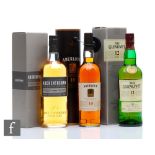 A collection of single malt whiskies, Auchentoshan single malt, Aberlour, 10 years old, and a bottle