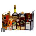 A collection of Whiskies and cognacs, to include a bottle of Dimple, a bottle of Johnnie Walker