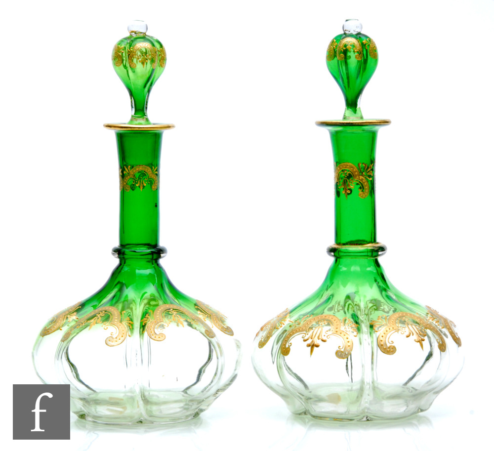 A pair of late 19th Century Moser crystal glass decanters circa 1885, the hexagonal lobed body