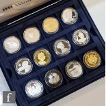 An Elizabeth II 'Elizabeth the Queen Mother' set twenty four silver and nickel crowns and other