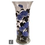 A large 1920s French Art Deco vase, enamel decorated with blue chrysanthemum and black foliage on