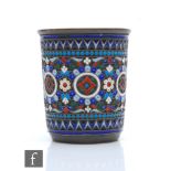 A Russian silver vodka cup decorated with cloisonne enamel decoration, weight 58g, height 6.5cm,