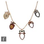 A 19th Century belcher link chain with five heart shaped, stone set open lockets attached, one