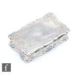 A Victorian hallmarked silver rectangular snuff box with engraved foliate decoration, length 7.