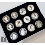 Seven Elizabeth II Australia silver proof dollars and four 'Churchill Man of Many Parts' Falkland