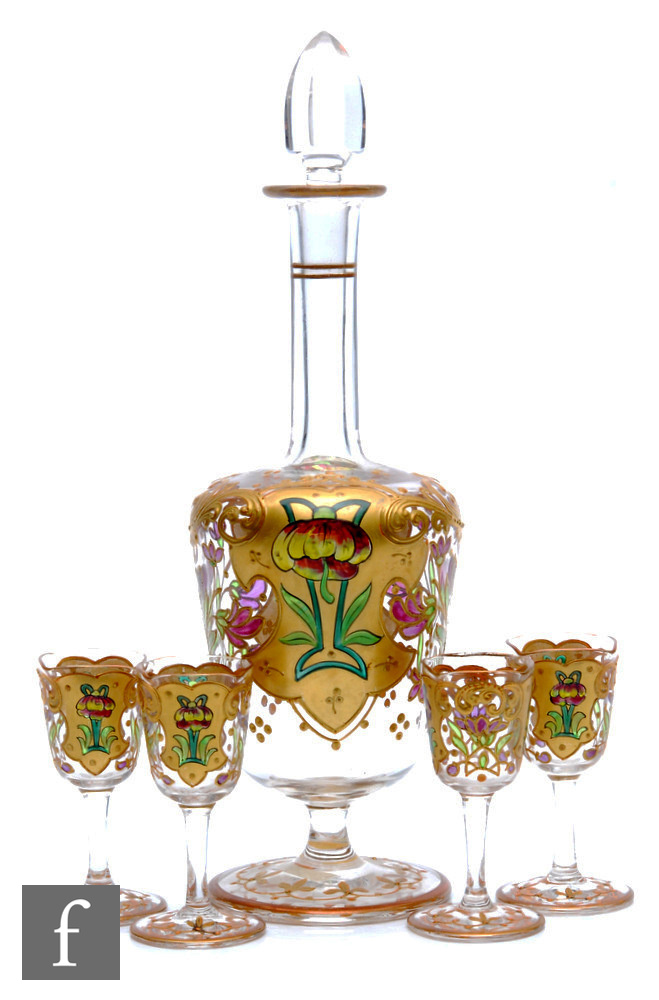 An Art Nouveau Continental liqueur set circa 1900, the shouldered ovoid decanter with a slender