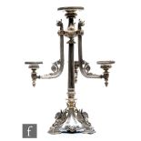 A Victorian hallmarked silver table centrepiece, three triform base detailed with hippocampus