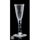 An 18th Century ale glass circa 1780, the round funnel bowl with an engraved OXO border, over a