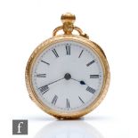 An 18ct hallmarked open faced crown wind fob watch, Roman numerals to a white enamelled dial, case