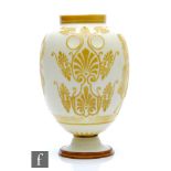 A late 19th Century Stevens & Williams Dolce Relievo vase of footed ovoid form with collar neck