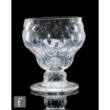 An 18th Century Monteith or bonnet glass circa 1750, the ogee bowl with a diamond mould above a