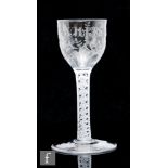 An 18th Century drinking glass circa 1765, with political interest, the ogee bowl engraved WILKES No