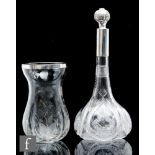 A large late 19th Century Stevens & Williams clear crystal decanter, the quatrelobed base rising