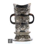 An early 20th Century hallmarked silver large twin handled vase decorated with swimming fish,