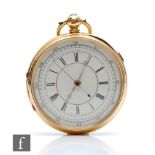 An 18ct hallmarked open faced chronograph pocket watch with Roman and Arabic numerals to a white