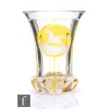 A 19th Century Biedermeier spa glass of footed flared hexagonal form, cased in citron over clear