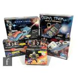 A collection of Playmates Star Trek items, comprising Generation Starfleet Communicator, Generations