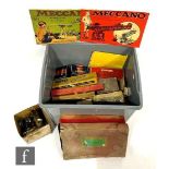 A collection of assorted Meccano pieces, red and green, to include boxes for Outfits 6 and 6a,