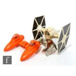 Three vintage Kenner Star Wars toys, a Tauntaun with closed belly, Imperial TIE Fighter, and a