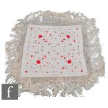 A 1920s Chinoiserie embroidered Manila (or piano) shawl, the ivory silk ground with red, pink,