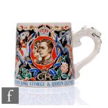A 1930s commemorative mug designed by Laura Knight to celebrate the 1937 coronation of King George