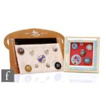 Fifteen assorted 19th Century and later buttons of varying form, all with enamel detailing to