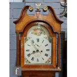 An early 19th Century oak longcase clock with eight-day movement, the twin swan neck pediment