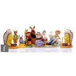 Six Royal Doulton figures comprising two Winnie the Pooh Big Chief Pooh from the Wild West