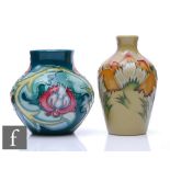 Two small Moorcroft Pottery vases, one decorated in the Magic Toadstool pattern designed by Kerry
