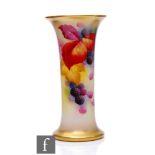 A Royal Worcester lily vase, panel decorated by Kitty Blake with hand painted autumnal leaves and