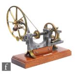 A 19th Century brass and steel English Mandril lathe, six spoke fly wheel with hand turn