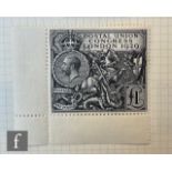 A Stanley Gibbons green 'Devon' stamp album containing a collection of Great Britain postage